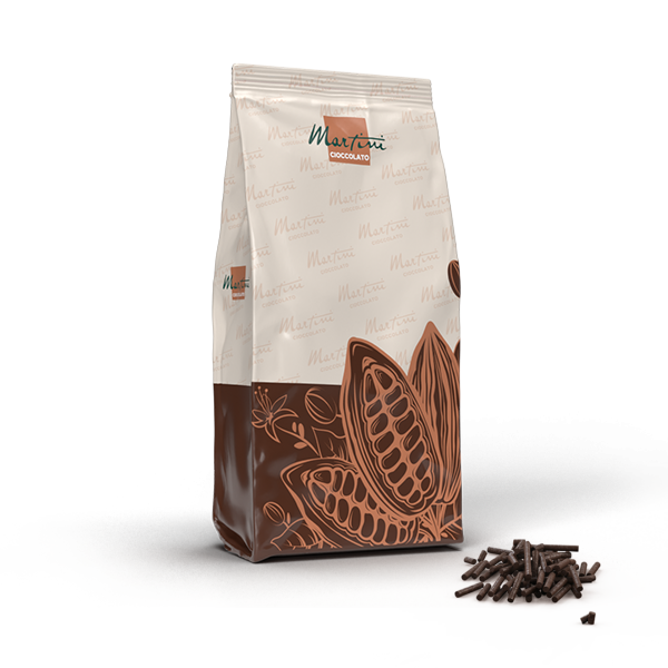Standing pouch of Martini Cioccolato brand chocolate with cocoa pod graphics, beside a small pile of chocolate shavings.