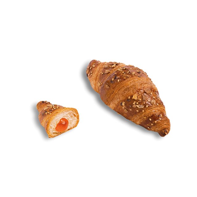 Two multigrain croissants with apricot filling, one whole and one halved to show the fruit center, on a white backgro...