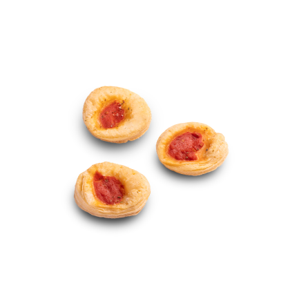 Three round puff pastry tartlets with tomato sauce filling, arranged on a white background.