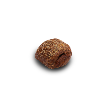 A round chocolate brigadeiro truffle coated in crunchy sprinkles, with a bite taken out revealing the fudgy interior.
