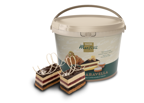 A large tub of Master Martini "Aravella" spreadable cream beside two layered cake slices with chocolate curls.