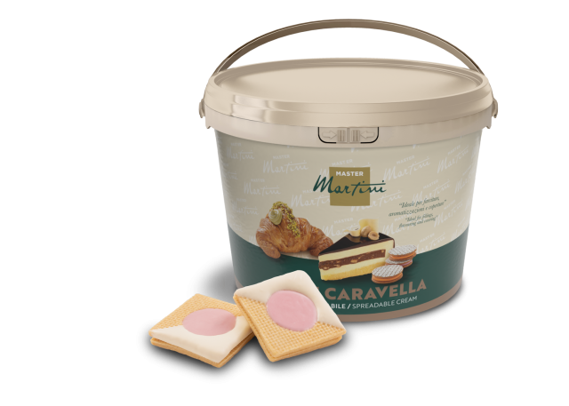 Beige bucket labeled Master Martini Caravella spreadable cream beside two square biscuits with pink filling.