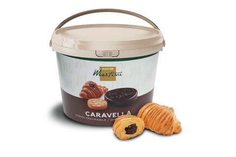 A large tub of Master Martini Caravella chocolate spreadable cream beside two croissants filled with chocolate filling.