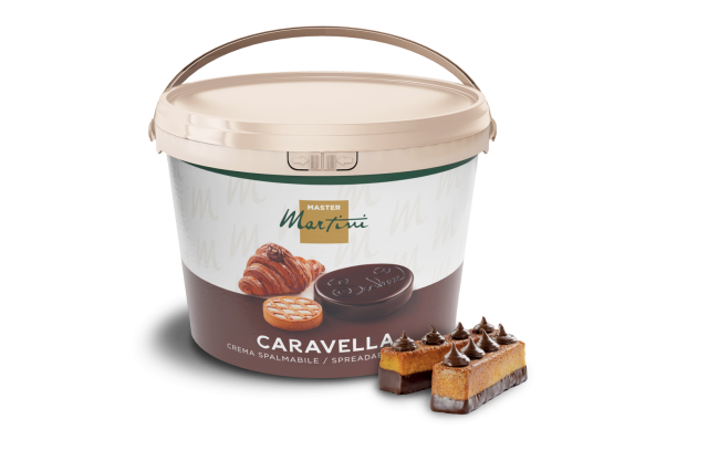 Bucket of Master Martini Caravella chocolate spreadable cream beside a chocolate-drizzled pastry dessert slice.