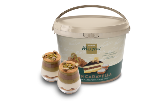 A large tub of Master Martini spreadable cream beside two dessert cups layered with cream, chocolate, and crushed pis...