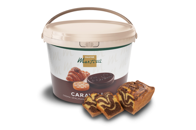A large tub of Master Martini Caravel spreadable cream beside sliced marbled chocolate-vanilla loaf cake.