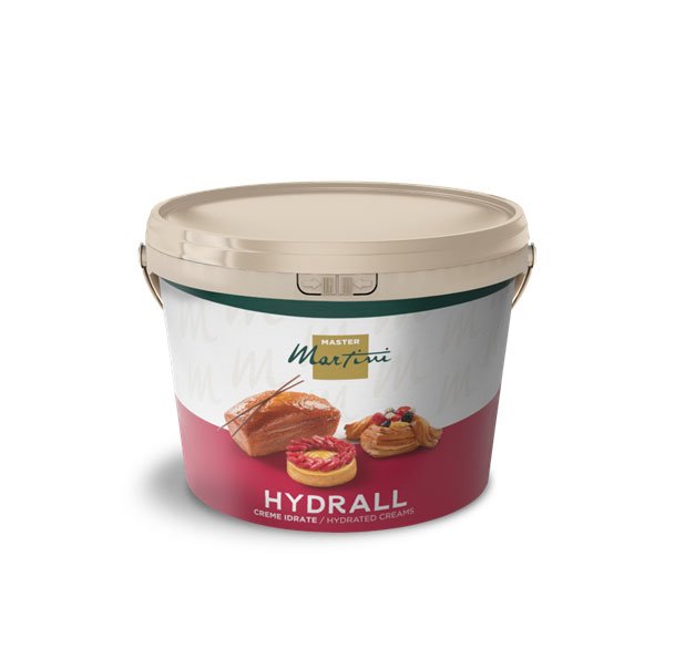 Beige bucket of Master Martini Hydrall hydrated creams, labeled with images of pastries and fruit tarts.