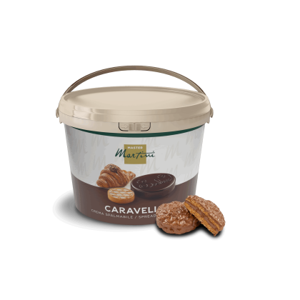Beige bucket of Master Martini Caravelle spreadable cream with a filled cookie sandwich beside it.