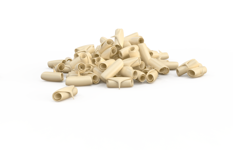 A pile of curled white chocolate shavings on a plain white background.