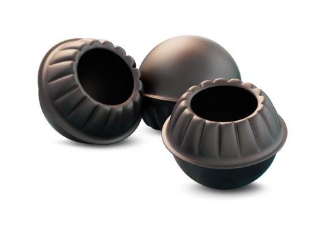 Three dark bronze spherical bowls with fluted rims, one lying on its side, on a white background.